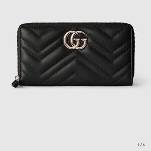 SOLD — Gucci Black Wallet with Gold Logo